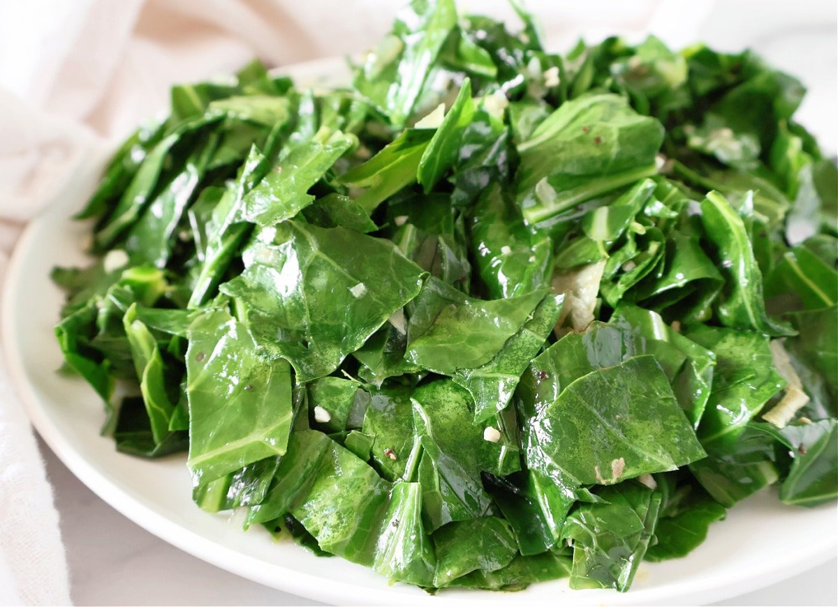 Braised Collard Greens ~ Southern-style greens slow-simmered with lots of garlic, onions, and simple seasonings. Vegetarian and vegan.