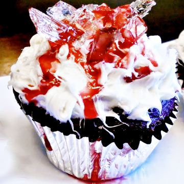 Bloody Broken Glass Cupcakes - Frosted cupcakes decorated with edible homemade sugar-based "broken glass" and edible "blood." Easy to make and perfect for a Halloween party! 