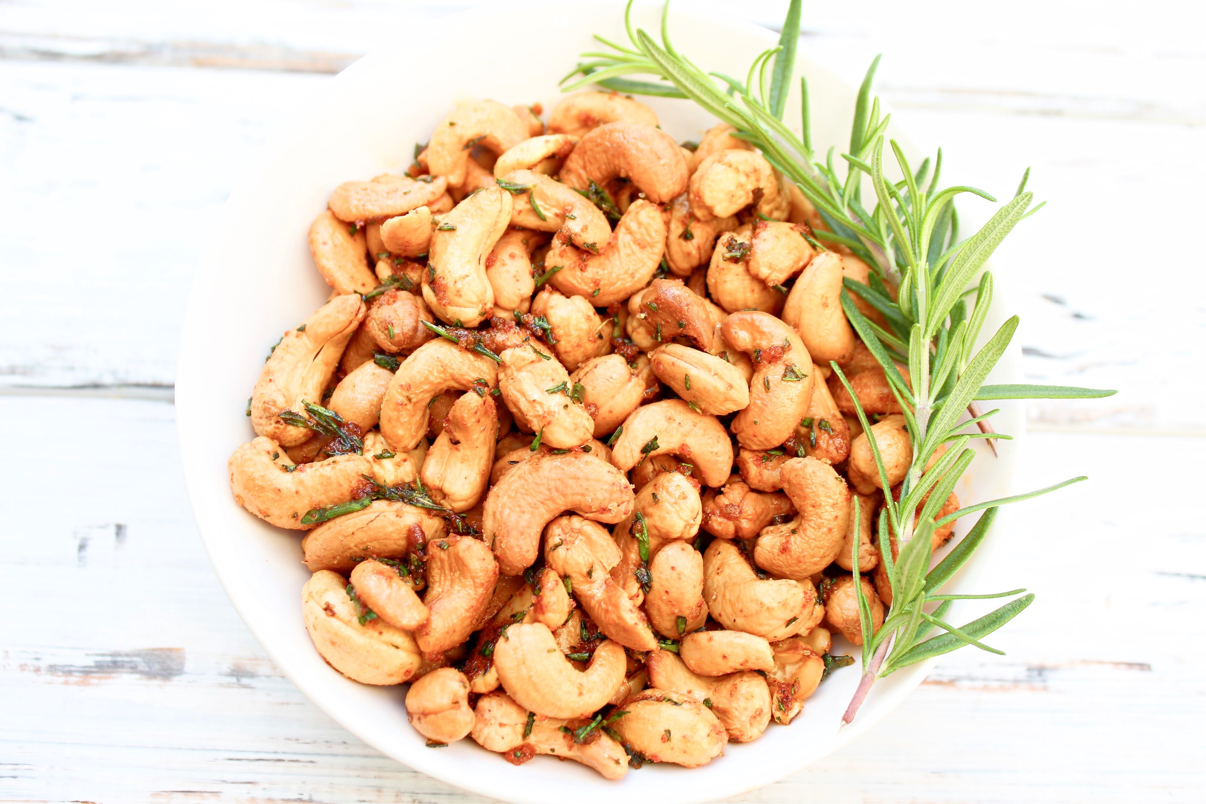 Rosemary Cashews ~ These roasted cashews are a little sweet, a little spicy, completely delicious, and perfect for holiday gifting!