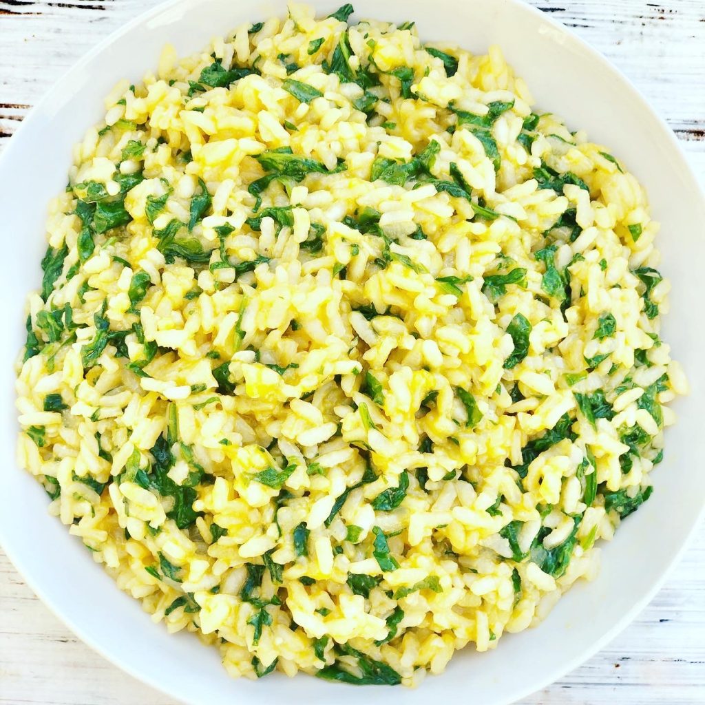 Vegan Spinach Risotto - A rich and creamy Italian comfort food meal made with fresh spinach, Arborio rice, and dairy-free feta cheese.