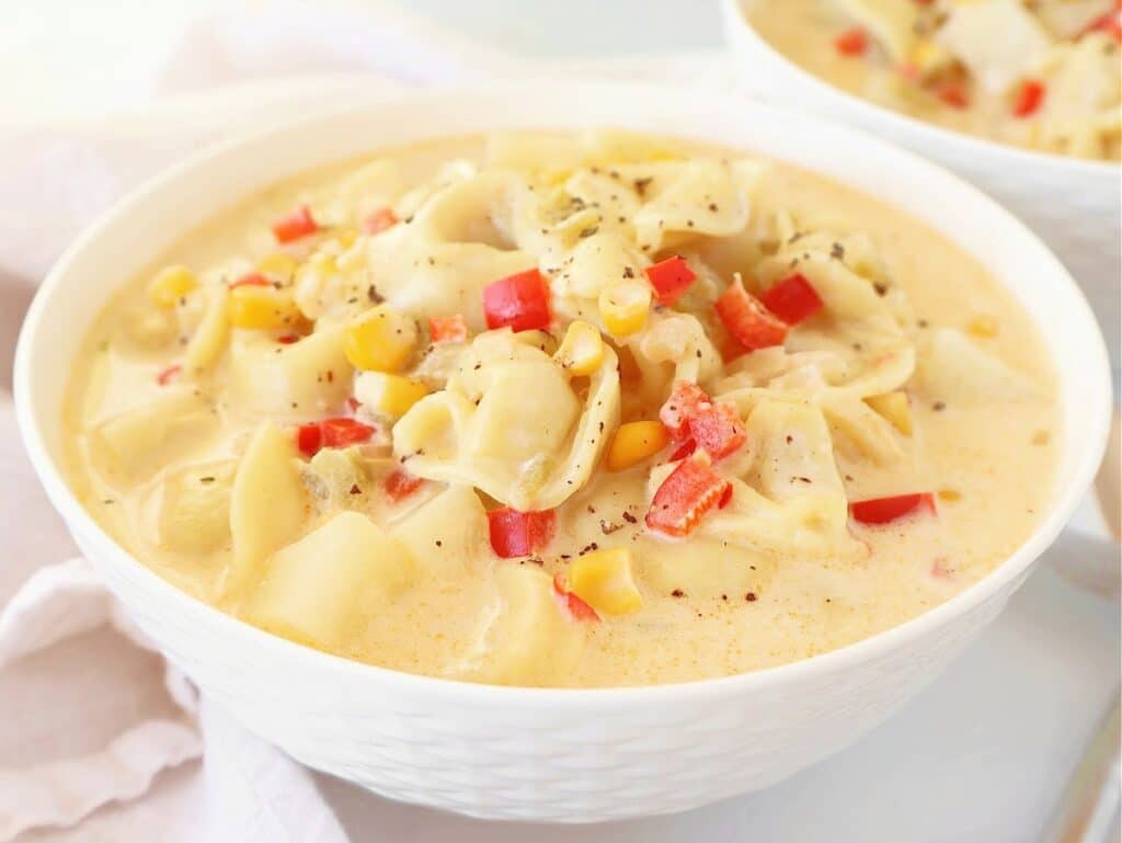 Vegetable Tortellini Chowder ~ Quick and hearty soup with tender vegetables, cheesy tortellini, and aromatic spices. Vegan or Vegetarian.