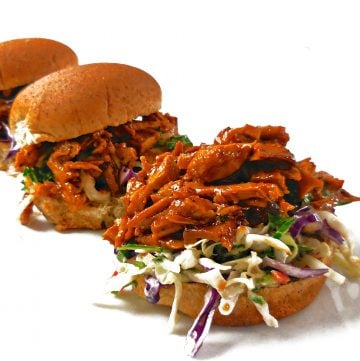 Slow Cooker Vegan BBQ - A classic combination of BBQ and coleslaw together in one bite, these easy sliders are like a taste of summer.