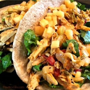 Vegan Chicken and Kimchi Tacos - Plant-based chicken-style strips are tossed with spicy kimchi and topped with a cool and chunky mixture of cantaloupe and lime for a tasty flavor combination!