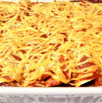 Beefy Bean and Cheese Vegan Enchiladas ~ These enchiladas are easy to make and perfect for feeding a crowd! Ready to serve in under an hour!