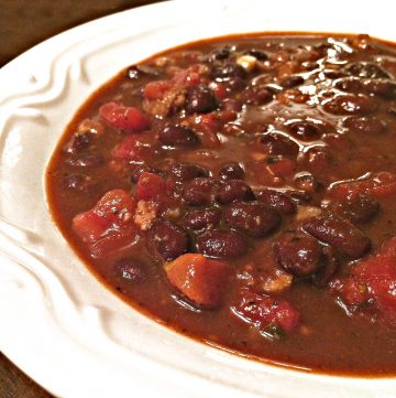 Beefy Black Bean Vegan Chili - A hearty bowl of deliciousness on the table in 30 minutes, easy. Serve on it's own or with your favorite toppings.