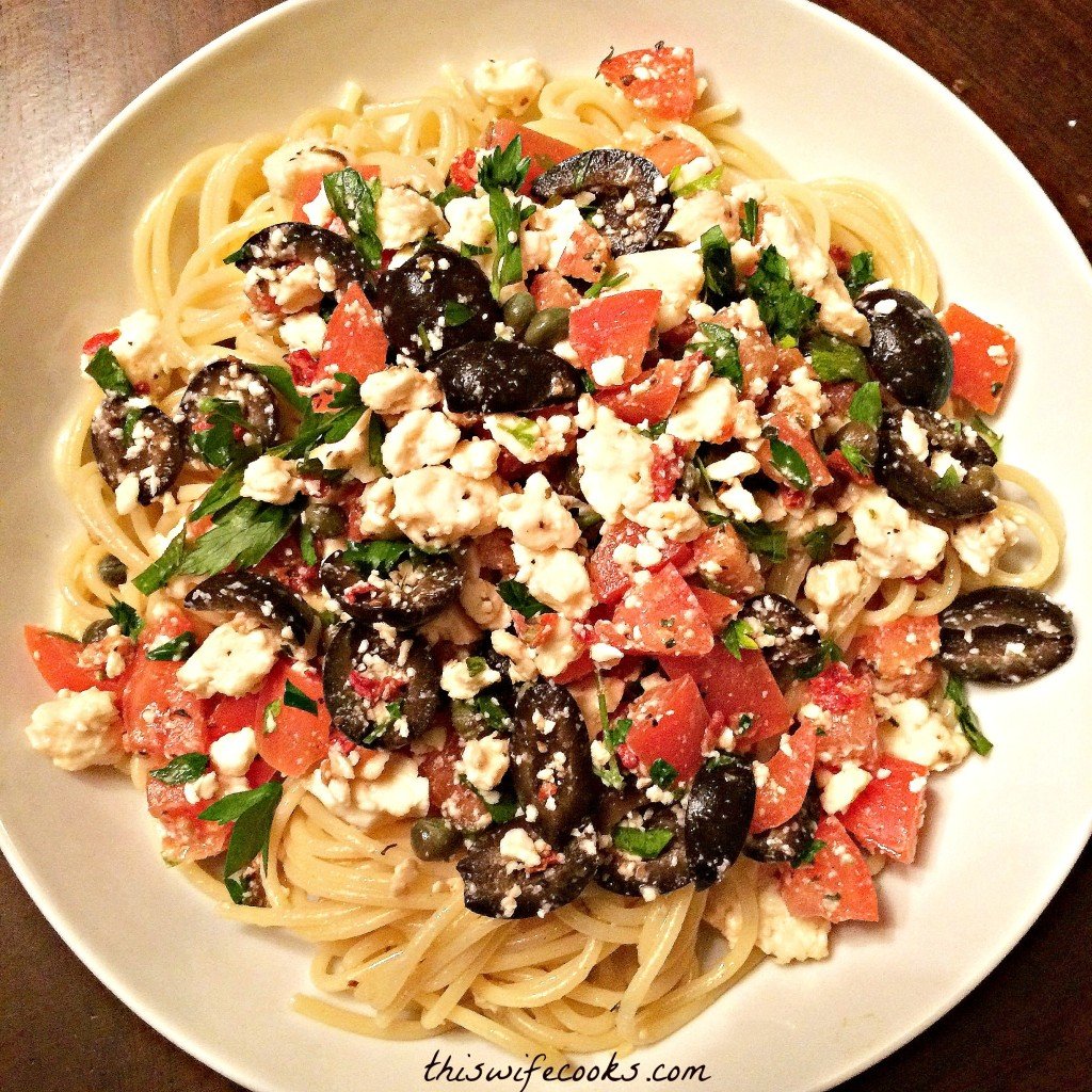 Vegan Mediterranean Pasta ~ A quick and easy Mediterranean-inspired dish with black olives, tomatoes, capers, and vegan feta cheese. Ready to serve in under 30 minutes!