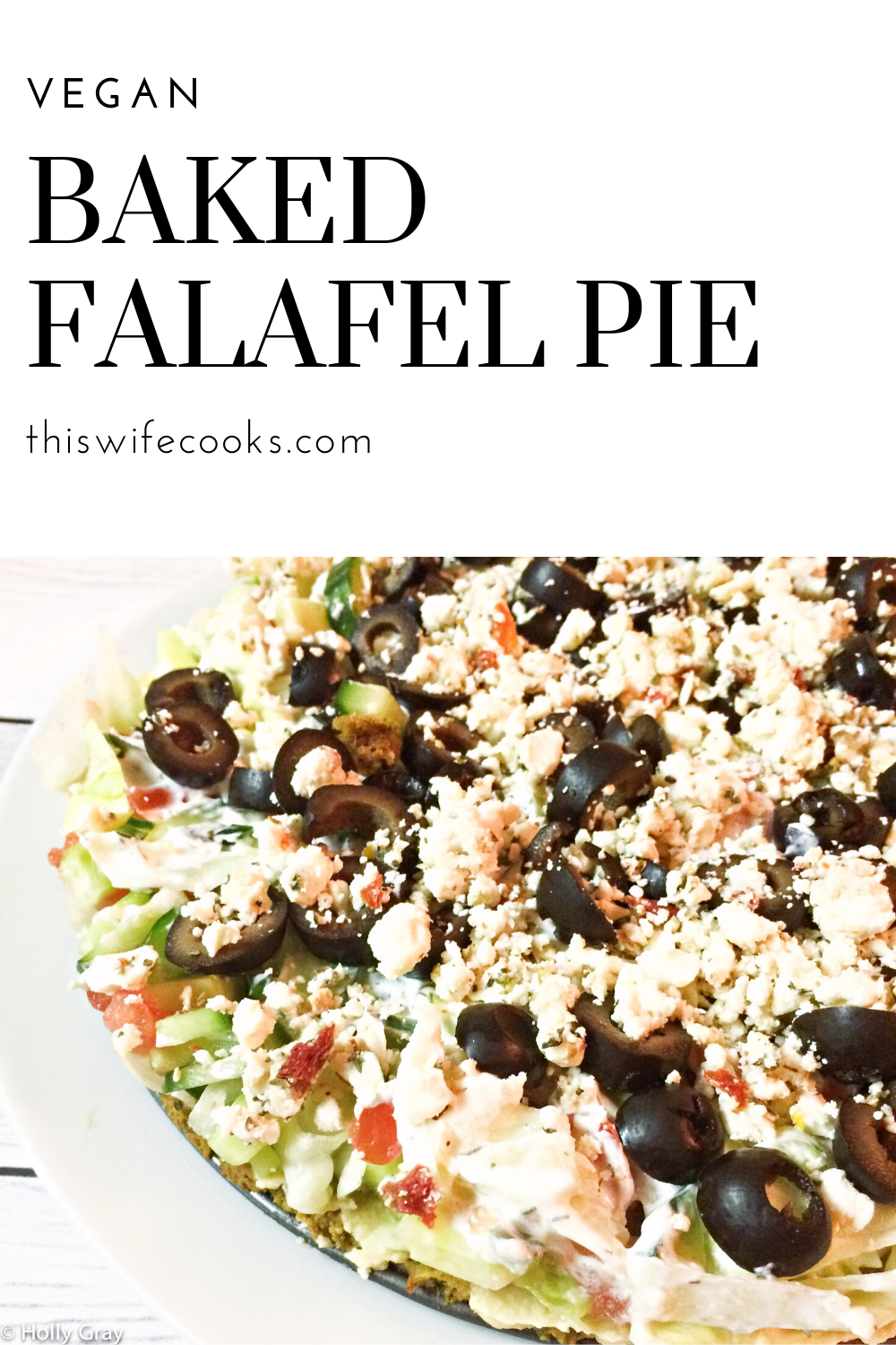 Baked Falafel Pie - A quick and easy meal with layers of falafel, hummus, tomatoes, cucumbers, lettuce, kalamata olives,  feta, and tzatziki sauce. via @thiswifecooks
