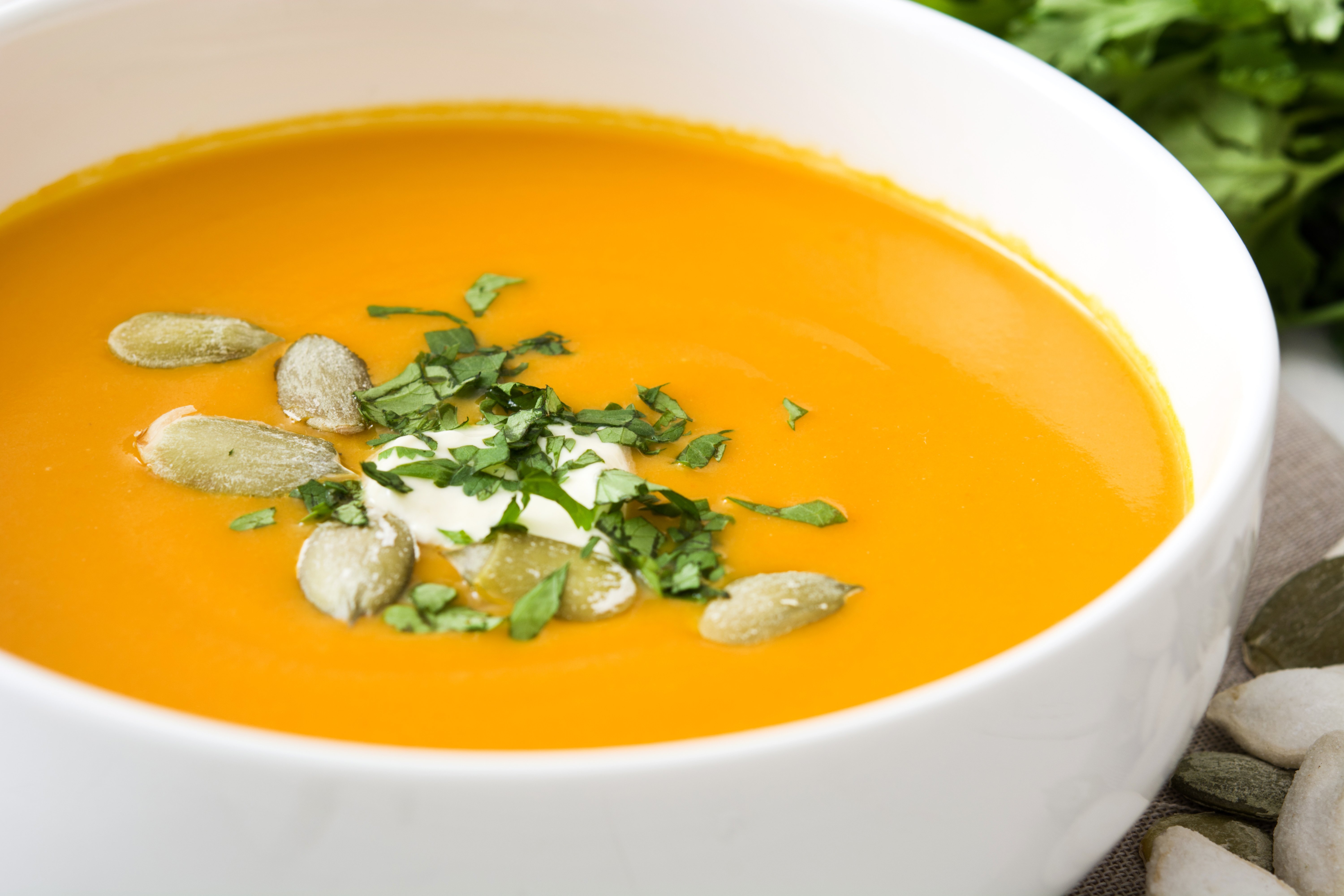 Vegan Curried Pumpkin Soup - Perfect with a salad for an easy lunch, this soup would also fit right in as a first course to Thanksgiving dinner. via @thiswifecooks