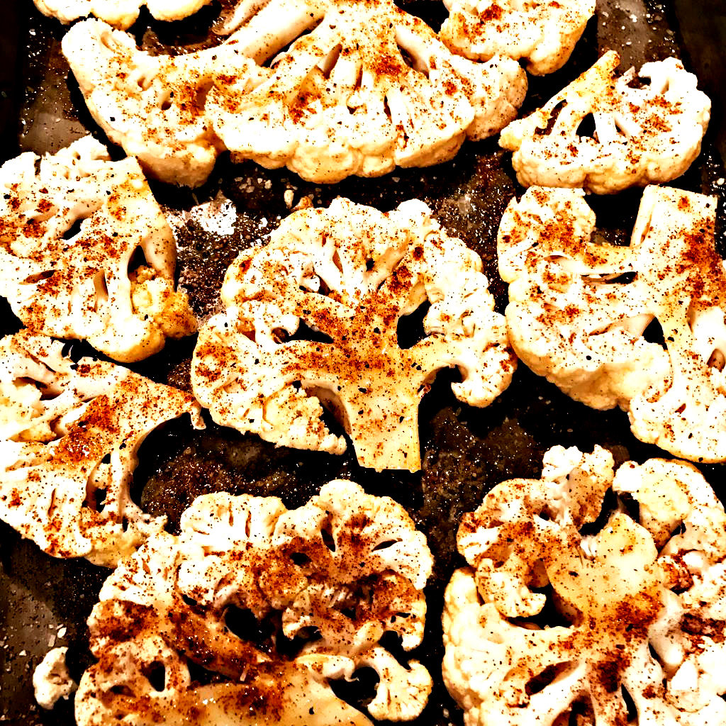 Easy Cauliflower Steaks - Ready to serve in 30 minutes or less, cauliflower steaks are the perfect go-to weeknight dinner! via @thiswifecooks