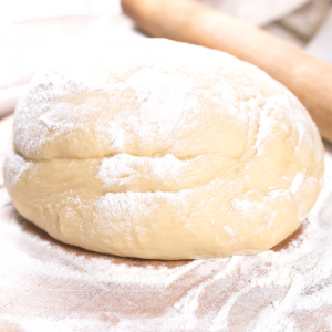 Homemade Pizza Dough - So quick and easy! The dough comes together in a snap. Perfect for your next pizza night at home! 