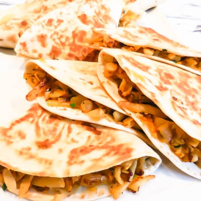 Easy, cheesy hash brown quesadillas. Only four ingredients and ready in about 30 minutes. Save time by using pre-shredded potatoes.