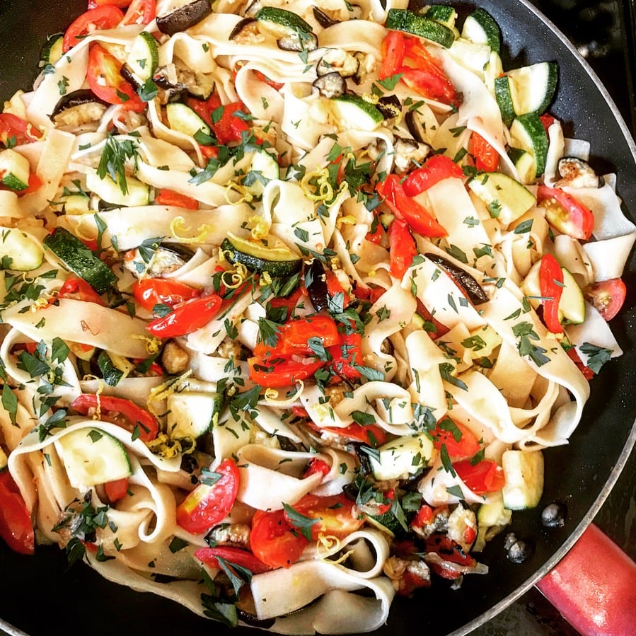 Vegan Pasta Ratatouille - An easy one pot dish bursting with zucchini, tomatoes, garlic, eggplant, lemon, & red peppers with fresh pappardelle pasta. via @thiswifecooks