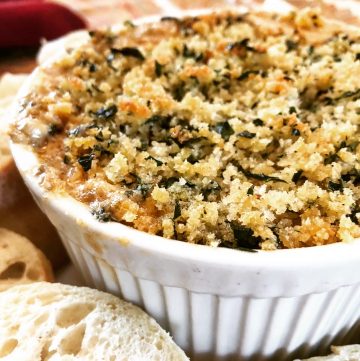 Vegan Stuffed Mushroom Dip | I knew this dip was a hit when I set it out as part of our pre-Thanksgiving snack spread and my meat and dairy-loving son declared, "Mom, this dip is insane!" I don't know what else to tell you other than, make it, then kick back and accept the compliments. | thiswifecooks.com