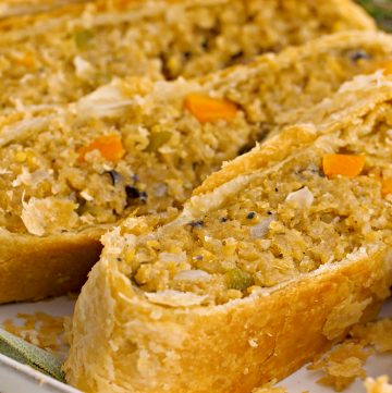 Vegan Thanksgiving Wellington - Loaded with savory quinoa, garbanzo beans, and veggies, then wrapped and baked in puff pastry.