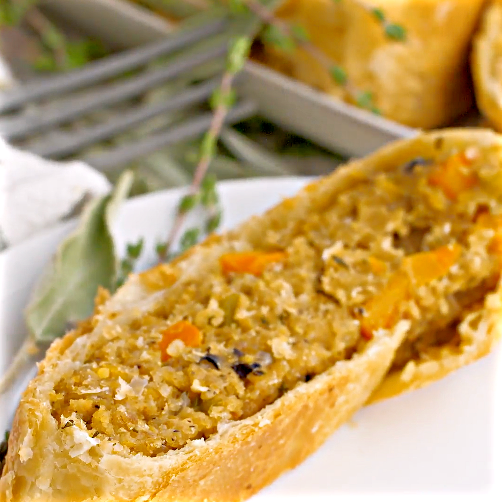 Vegan Thanksgiving Wellington - Loaded with savory quinoa, garbanzo beans, & veggies, then wrapped & baked in puff pastry. Loved by vegans and meat-eaters alike!