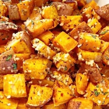 Herb Roasted Sweet Potatoes ~ Roasted sweet potatoes with garlic, thyme, and parmesan. Easy and savory side dish for the holiday table!