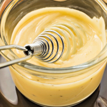 Easy Vegan Hollandaise Sauce | The classic hollandaise sauce has gone vegan and the flavor is exactly what you remember of the egg-based version. | thiswifecooks.com