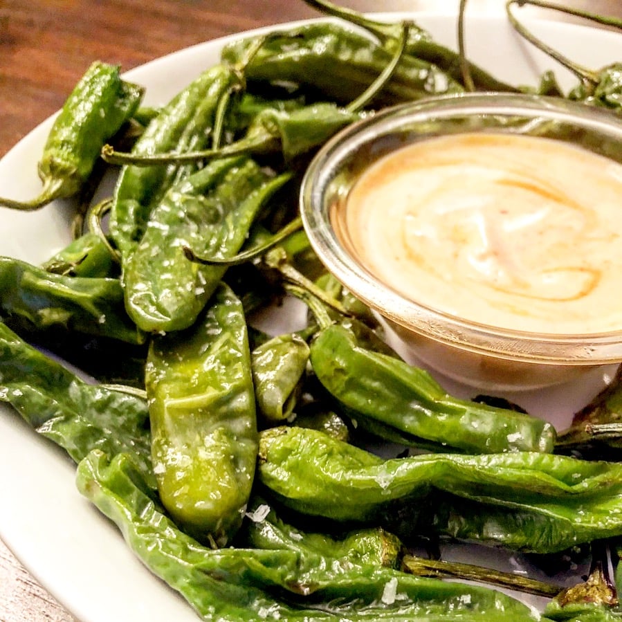 Air-fried Shishito Peppers recipe - A super easy crowd-pleasing and plant-based snack that is ready to serve in just 10 minutes!  via @thiswifecooks