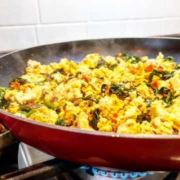 Saturday Morning Tofu Scramble - A quick and easy vegan breakfast tofu scramble the whole family will love! This recipe is very forgiving and easy to customize to what you have on hand.