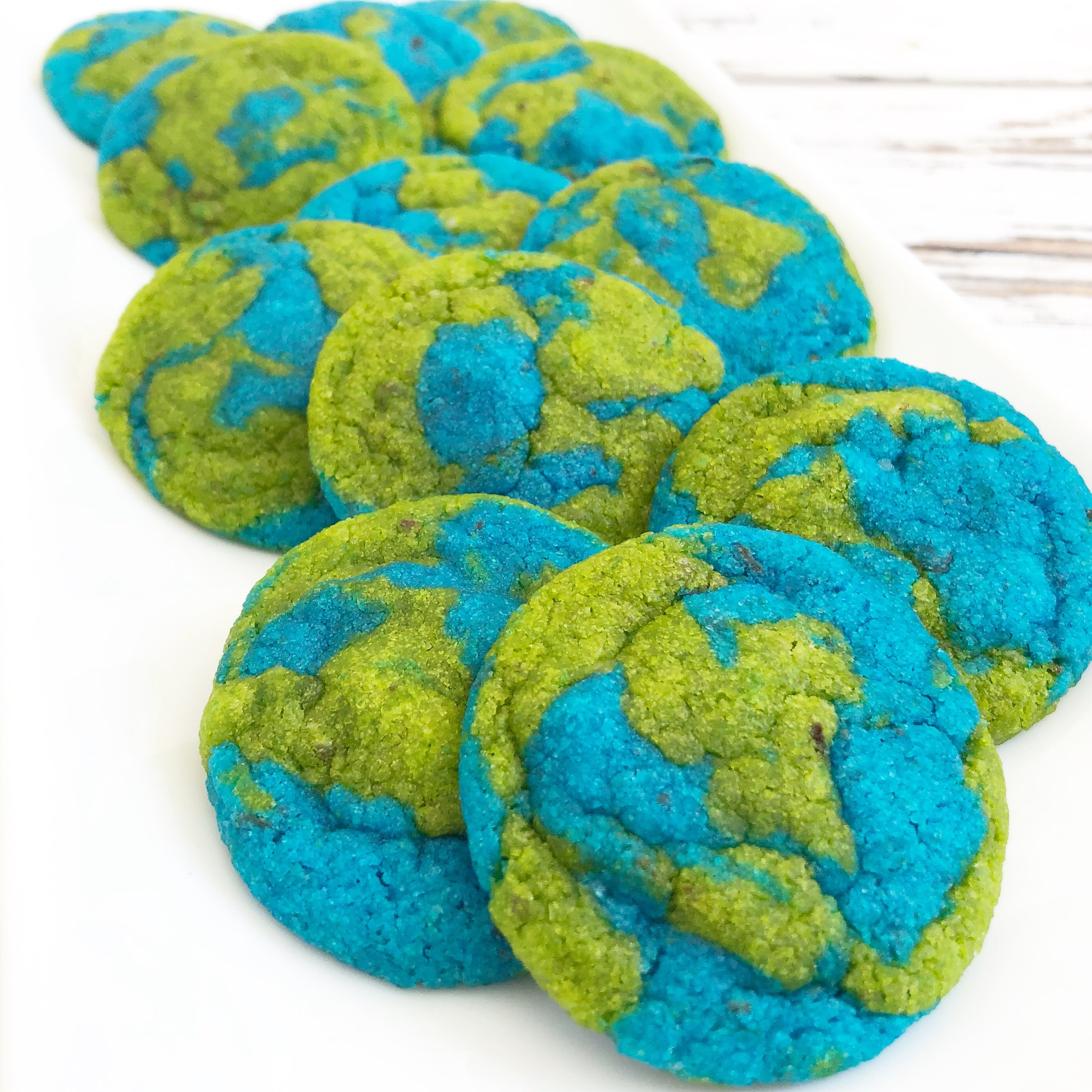 Vegan Earth Day Cookies! These semi-homemade and dairy-free cookies are super easy to make and are absolutely perfect for Earth Day! via @thiswifecooks