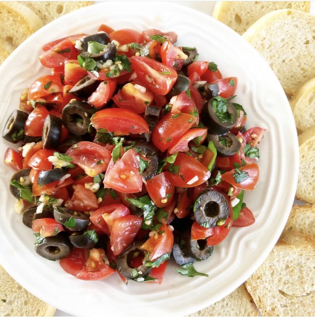 Tomato and Black Olive Bruschetta - Simple and elegant. Perfect for a casual picnic lunch for two or when entertaining guests at home.