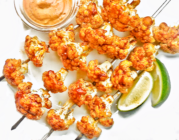 Easy, crowd-pleasing kabobs seasoned with a Cajun-inspired blend of spices and served with homemade adobo dipping sauce. Perfect for camping or easy grilling at home.
