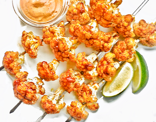 Spicy Grilled Cauliflower with Adobo Dipping Sauce - Easy, crowd-pleasing spicy grilled cauliflower kabobs seasoned with a Cajun-inspired blend of spices and served with homemade adobo dipping sauce. via @thiswifecooks