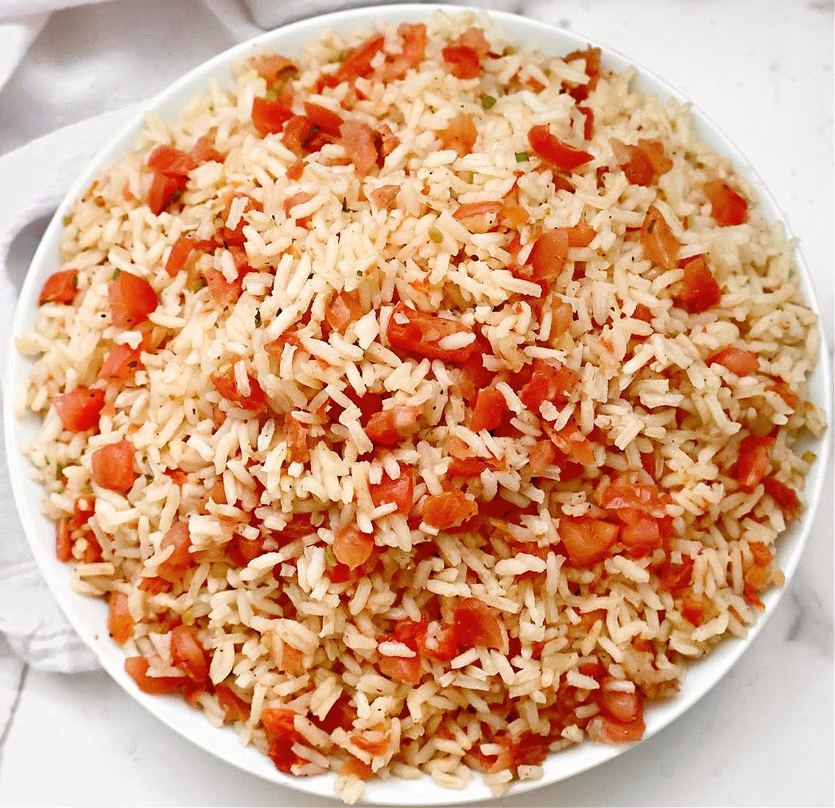 5-Ingredient Spanish Rice ~ A quick and easy side dish to complement your next Mexican dinner or Cinco de Mayo feast! Vegetarian or Vegan.