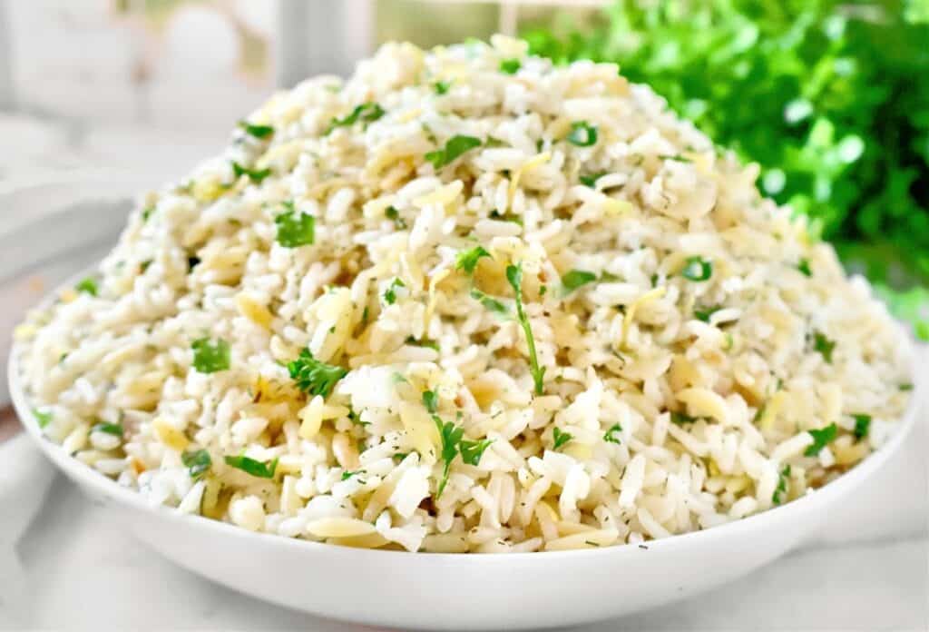 Lemon Orzo and Rice Pilaf ~ Orzo pasta and rice simmered in a lemon and dill-seasoned broth and topped with fresh parsley and lemon zest. 
