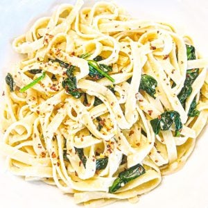 Vegan Spinach Parmesan Fettuccine - Just 5 ingredients! Vegan spinach parmesan fettuccine is a favorite go-to meal when we're short on time or crave the simplicity of an easy, no-fuss dinner.