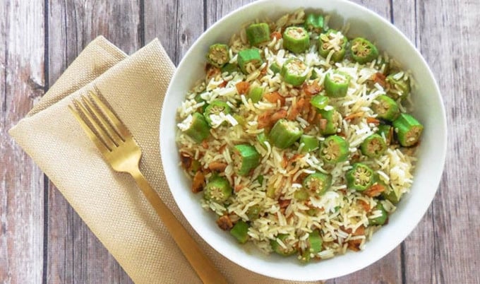 Late Summer Okra Rice Pilaf with Coconut Bacon |Fresh okra is tossed with a bold and savory, cayenne-infused rice pilaf then topped with a sweet and smoky homemade coconut bacon.