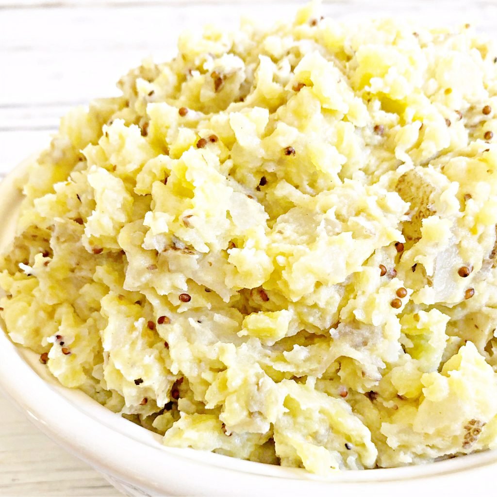 Vegan Whole Grain Mustard Mashed Potatoes | Simple, savory, and ready to serve in under 30 minutes. A perfect addition to the Oktoberfest or St. Patrick's Day menu!