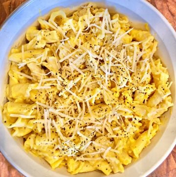 Creamy Vegan Butternut Squash Pasta - Simple & savory, quick & easy pasta with in a creamy sauce of butternut squash, cashews, onions, and spices  A nice holiday alternative to mac & cheese!