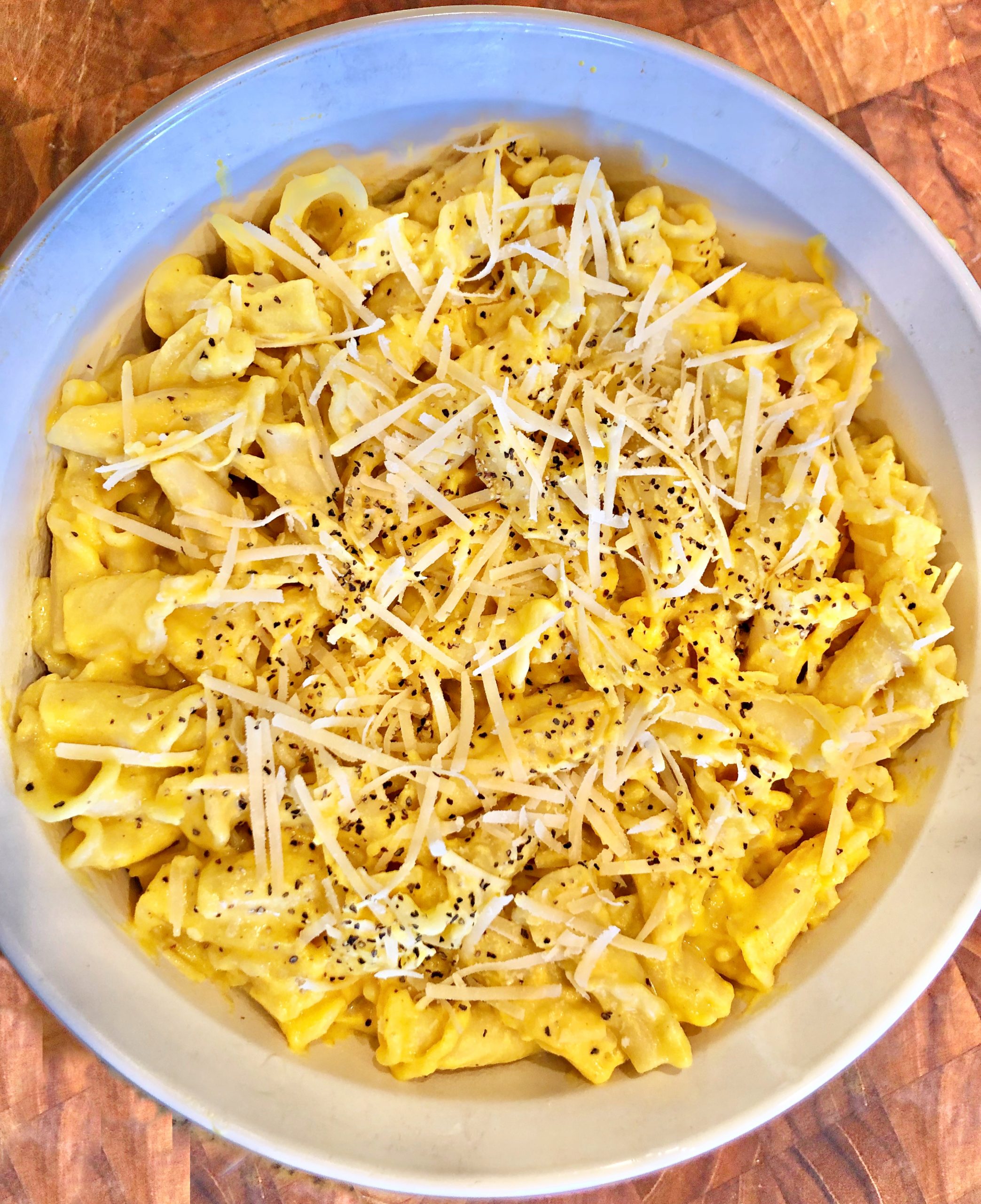 Creamy Vegan Butternut Squash Pasta - Simple & savory, quick & easy pasta with in a creamy sauce of butternut squash, cashews, onions, and spices  A nice holiday alternative to mac & cheese! via @thiswifecooks