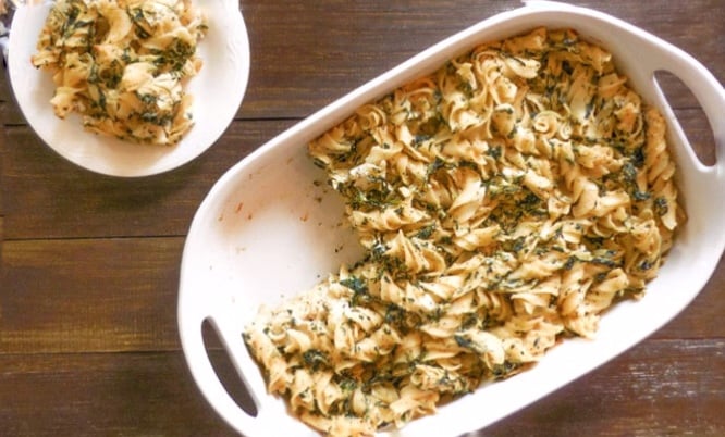 Vegan Spinach Noodle Kugel | A simple but classic comfort food dish that is perfect for brunch or the holiday table. Wide fusilli pasta is tossed with a rich homemade sauce and baked until slightly crisp on top for a cozy casserole that family and friends will love!