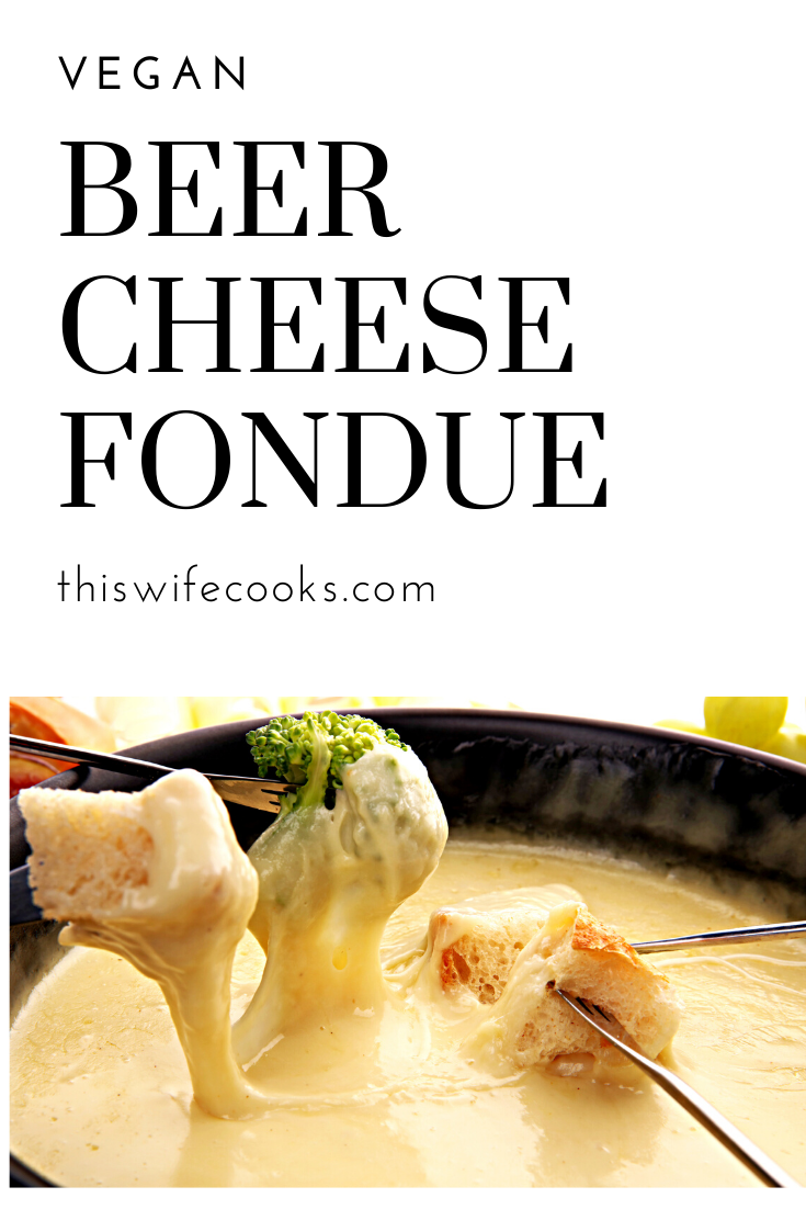 A crowd pleasing vegan beer cheese fondue perfect for holiday get-togethers, game day, or anytime you want to add a fun communal twist to dinner at home! via @thiswifecooks