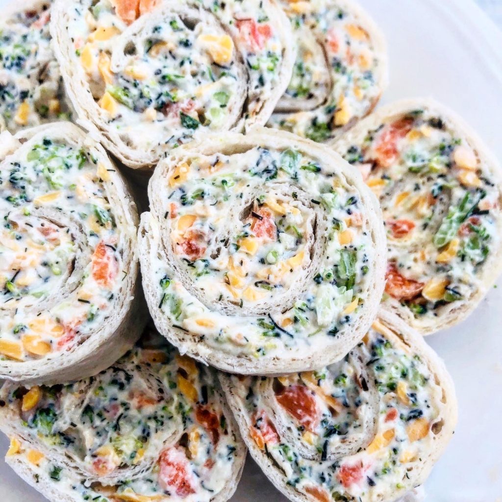 Vegan Veggie Pinwheels - Broccoli and carrots with all-vegan cream cheese, mayonnaise, cheddar cheese, herbs & spices for an easy, crowd-pleasing appetizer!