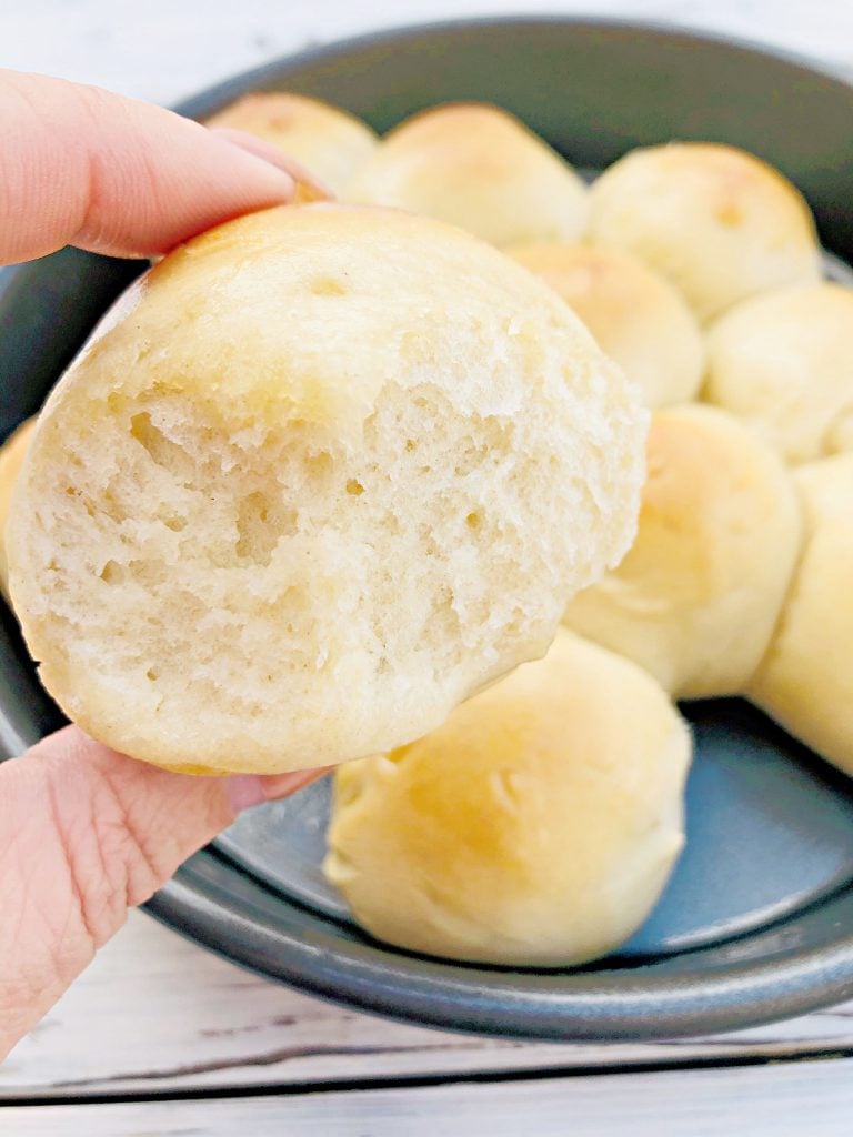 Easy Vegan Pull-Apart Dinner Rolls - Impress your guests with soft and fluffy homemade dinner rolls! Perfect for the holiday dinner table! | thiswifecooks.com #thanksgivingbreadrollrecipe #yeastrolls #dairyfreedinnerrolls #veganthanksgivingrecipes #thiswifecooksrecipes