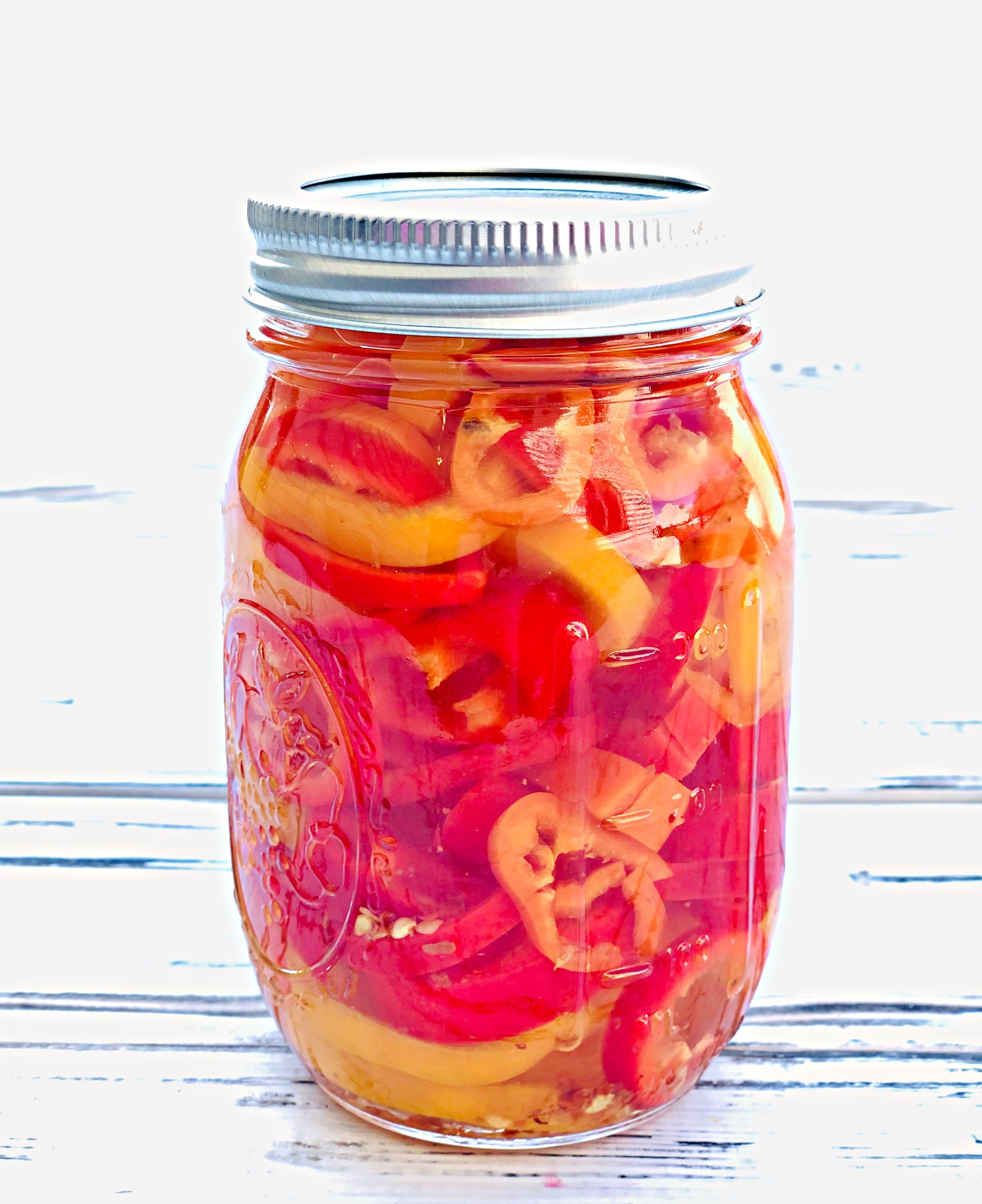 Sweet and Spicy Pickled Mini Peppers

A quick and easy recipe for pickling peppers!

#howtopicklepeppers #canningrecipes #pickledpeppers #whattodowithminipeppers #canningandpreserving #thiswifecooksrecipes via @thiswifecooks