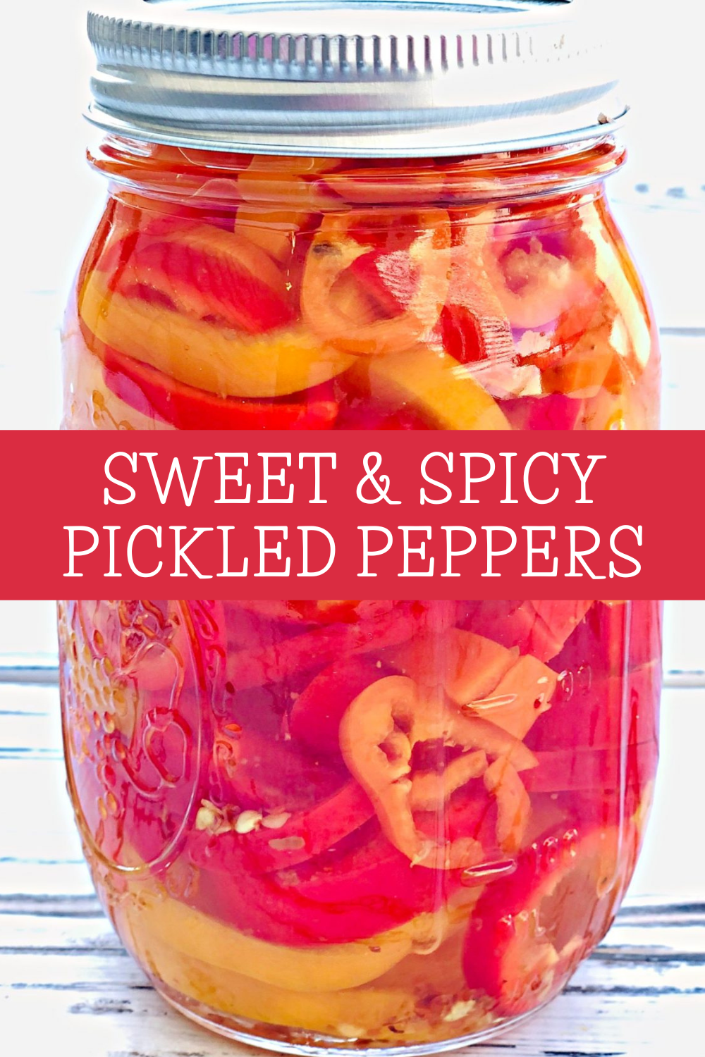 Sweet and Spicy Pickled Mini Peppers – A quick-pickle recipe with tangy vinegar, sugar, and crushed red pepper flakes. Great for adding to sandwiches, salads, or cheese boards. via @thiswifecooks