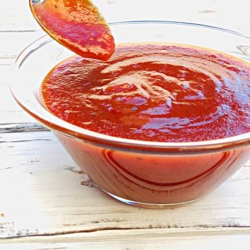West North Carolina tomato and vinegar-based sauce is a Southern cooking staple that is very easy to make with simple pantry ingredients. #carolinabbqsauce #thiswifecooksrecipes #ketchupbasedbbqsauce #savorybbqsauce