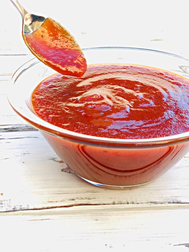 West North Carolina tomato and vinegar-based sauce is a Southern cooking staple that is very easy to make with simple pantry ingredients. #carolinabbqsauce #thiswifecooksrecipes #ketchupbasedbbqsauce #savorybbqsauce