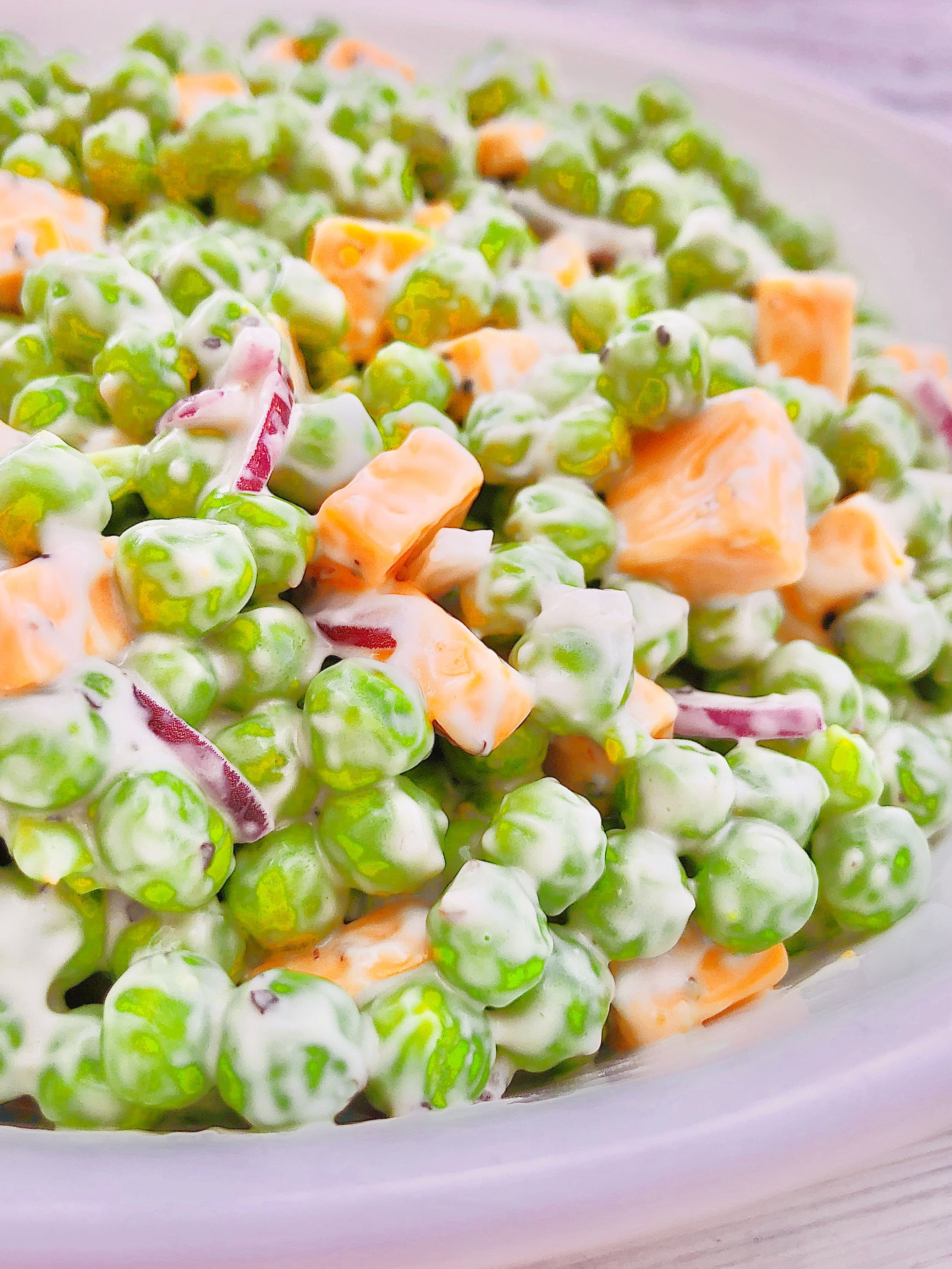 Green Pea and Cheddar Salad - A classic side dish made with only a handful of simple plant-based ingredients!

#veganpotluck #veganeasterrecipes #plantbasedsidedish #thiswifecooksrecipes #easyveganrecipes #veganbrunchrecipes #veganpeasalad #veganbbqside via @thiswifecooks