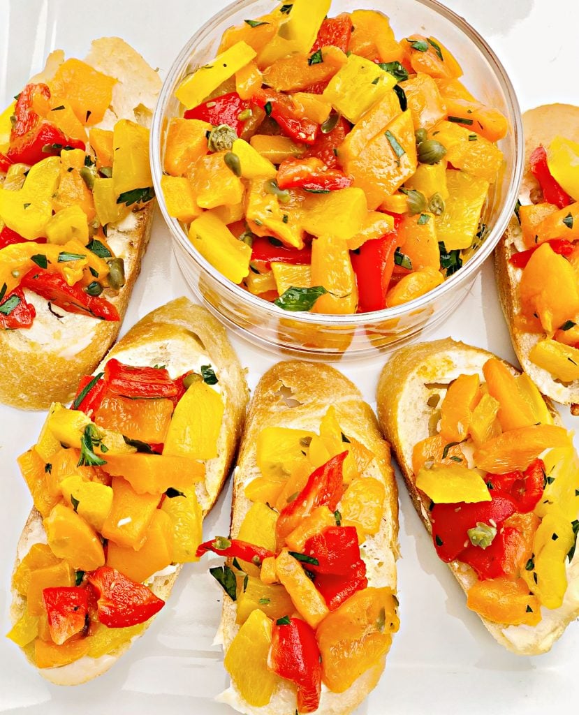 Sweet Bell Pepper Bruschetta - Colorful bell peppers are marinated with olive oil, white balsamic vinegar, capers, and Italian flat-leaf parsley for a quick and easy appetizer perfect for entertaining.