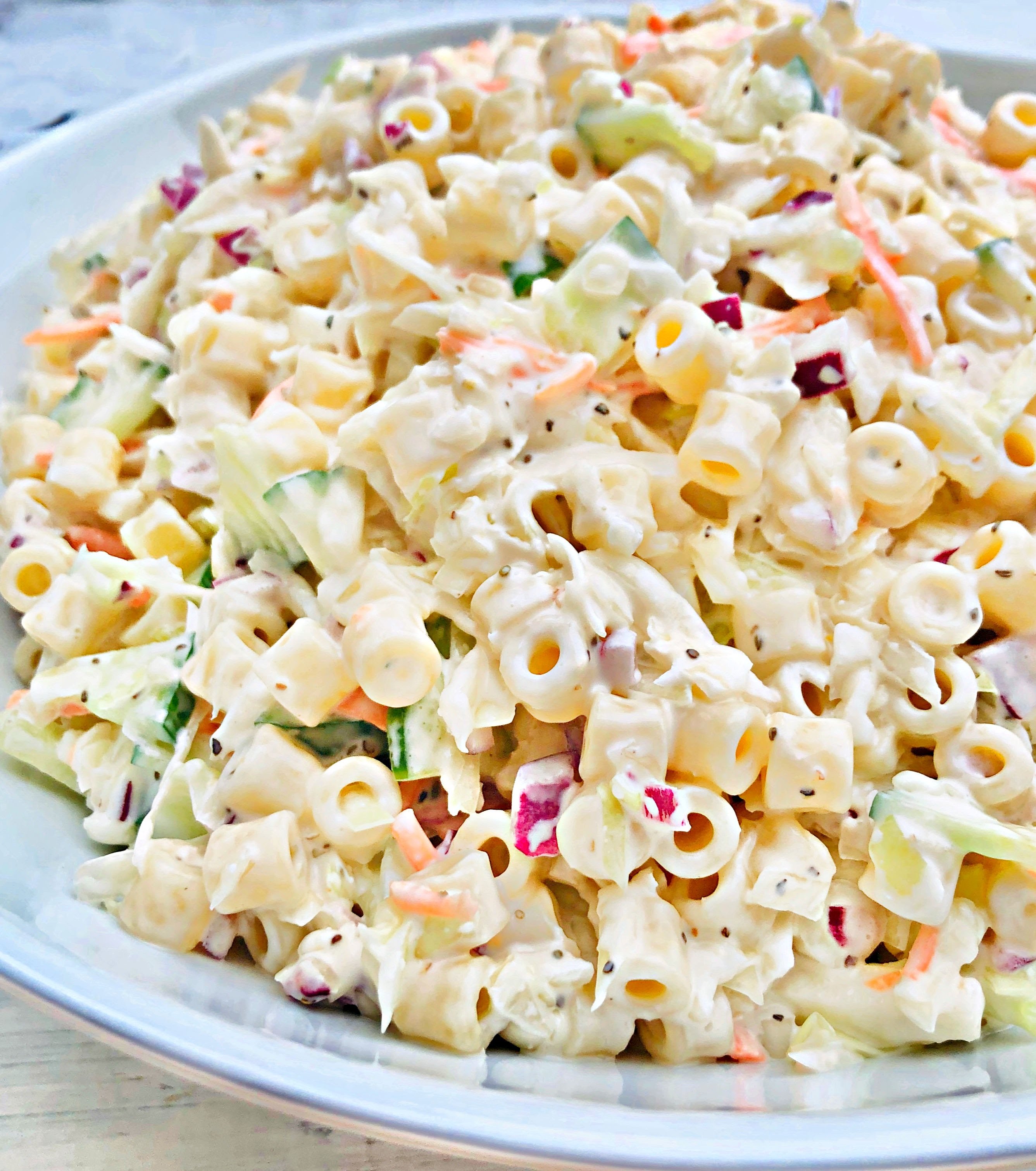 Coleslaw Pasta Salad - An easy, make-ahead side dish recipe perfect for backyard barbecues, potlucks, and holiday gatherings! via @thiswifecooks