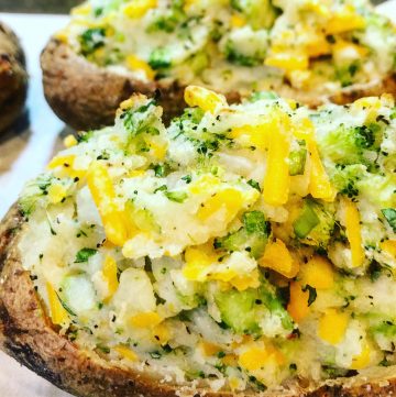 Vegan Twice Baked Potatoes -  A simple and savory, crowd-pleasing comfort food classic! Easy to make and knocks the socks off plain baked potatoes any day!