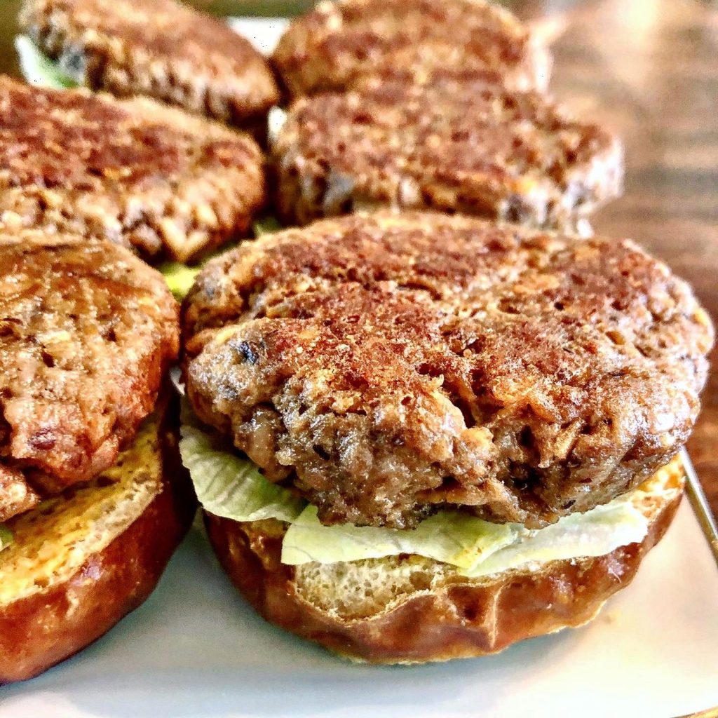 Beyond Impossible Vegan Burgers and Sliders - This recipe yields 6 thick pub-style burgers or 12 hearty sliders. Perfect for cookouts or tailgating, these 100% plant-based burgers will satisfy even the most hardcore carnivores in the crowd.
