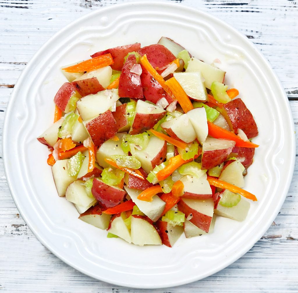 German Potato Salad ~ A vinegar-based potato salad made with baby red potatoes, celery, shallot, and sweet bell peppers. Ready to serve in 20 minutes or less!
