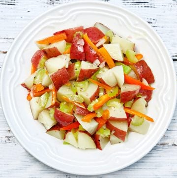 German Potato Salad ~ A vinegar-based potato salad made with baby red potatoes, celery, shallot, and sweet bell peppers. Ready to serve in 20 minutes or less!