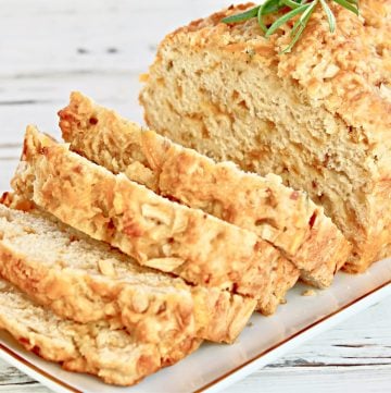 Apple Cheddar Rosemary Bread ~ Sweet and savory beer bread with the classic flavor combination of apples, cheddar cheese, and fresh rosemary. Guaranteed to make your house smell like fall!